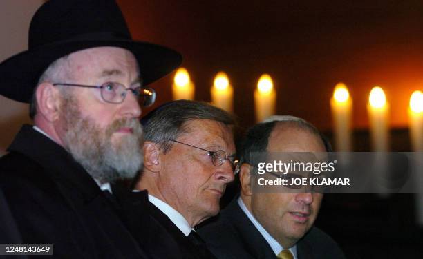 Austrian Chancellor Wolfgang Schuessel , Vienna's Rabbi Haim Eisenberg and the President of the Jewish community in Vienna Ariel Muzikant listen to...