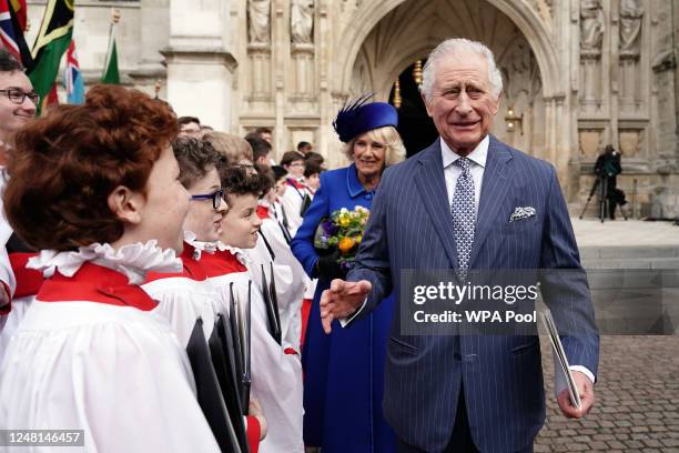 King Charles III and Camilla, Queen Consort meet with choristers following the annual Commonwealth Day Service at Westminster Abbey on March 13, 2023...