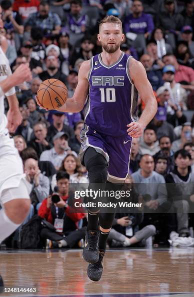 Domantas Sabonis of the Sacramento Kings brings the ball up the court ...