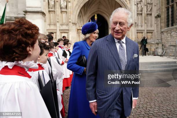 King Charles III and Camilla, Queen Consort meet with choristers following the annual Commonwealth Day Service at Westminster Abbey on March 13, 2023...