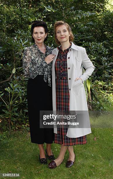 Actress Iris Berben and actress Nadja Uhl attend a photocall on the set of "Ein Weites Herz" on September 13, 2011 in Berlin, Germany.
