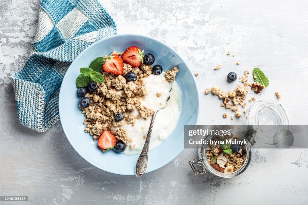 Homemade granola on black plate