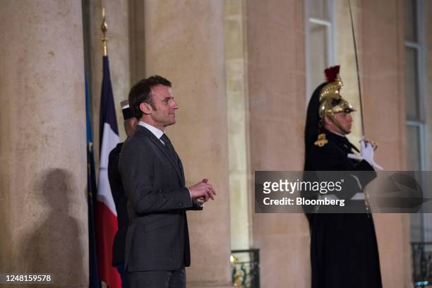Emmanuel Macron, France's president, waits for Viktor Orban, Hungary prime minister, not pictured, ahead of their working dinner at the Elysee Palace...
