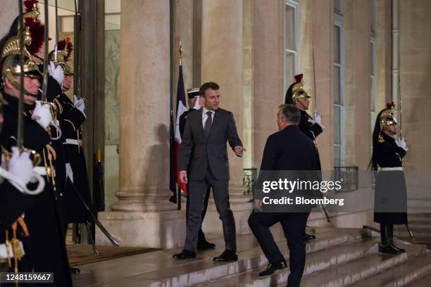 Emmanuel Macron, France's president, center left, welcomes for Viktor Orban, Hungary prime minister, ahead of their working dinner at the Elysee...