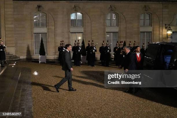 Emmanuel Macron, France's president, left, welcomes for Viktor Orban, Hungary prime minister, right, ahead of their working dinner at the Elysee...