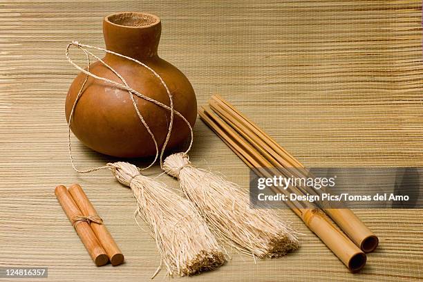 studio shot of hula implements, ipu, pu' || chr(39) || 'ili and kala' || chr(39) || 'au - beach mat stock pictures, royalty-free photos & images