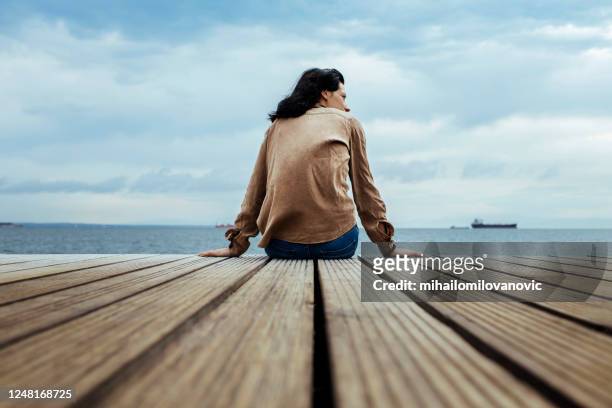 soaking in the seaside atmosphere - thessalonika stock pictures, royalty-free photos & images