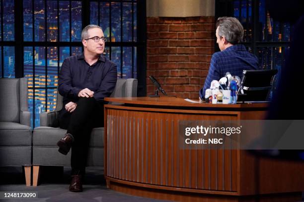 Episode 1405 -- Pictured: Comedian John Oliver during an interview with host Seth Meyers on March 13, 2023 --