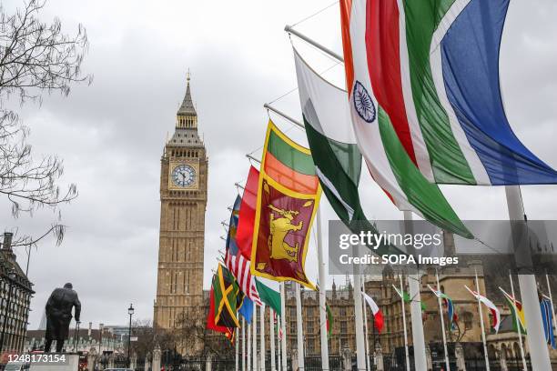 Flags of the 56 nations of the Commonwealth fly around Parliament Square in Westminster on Commonwealth Day.