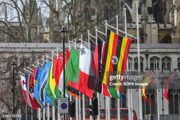 Flags of the 56 nations of the Commonwealth fly around Parliament Square in Westminster on Commonwealth Day.