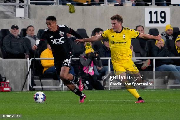Andy Najar of D.C. United controls the ball while Chris Durkin of D.C. United defends during the first half between the the Columbus Crew and the...
