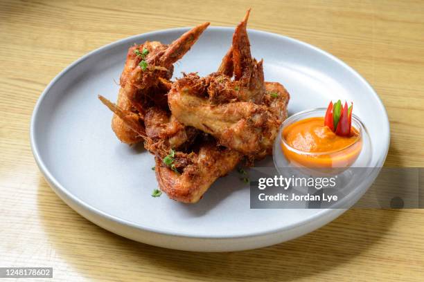 fried chicken wing - chicken wings plate stock pictures, royalty-free photos & images