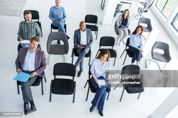 social distancing at board room! - social distancing stock pictures, royalty-free photos & images