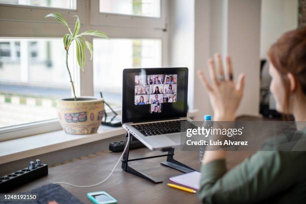 video call with team members at office - reopening ceremony stock-fotos und bilder