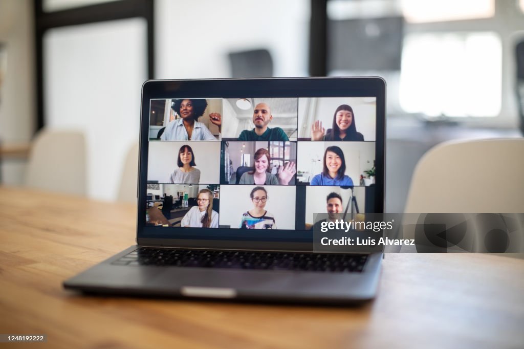 Colleagues having a work meeting through a video call