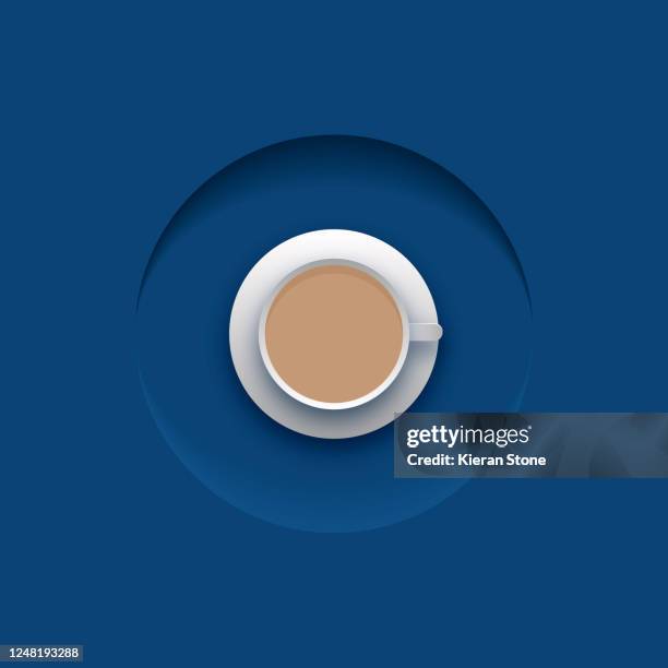 top down coffee or tea on blue background - cup of tea from above fotografías e imágenes de stock