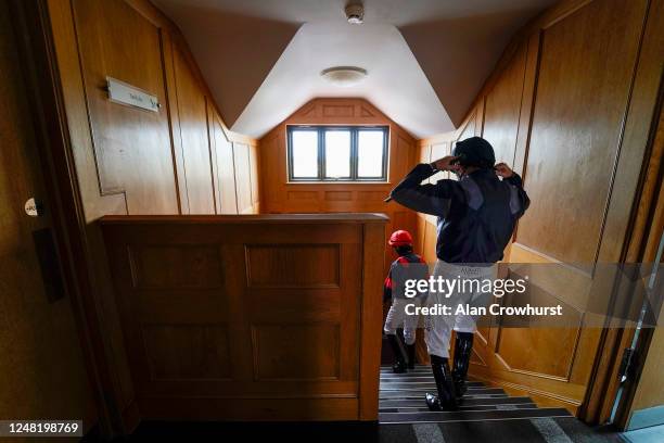 General view as jockeys make their way to the parade ring at Chelmsford City Racecourse on June 08, 2020 in Chelmsford, England.