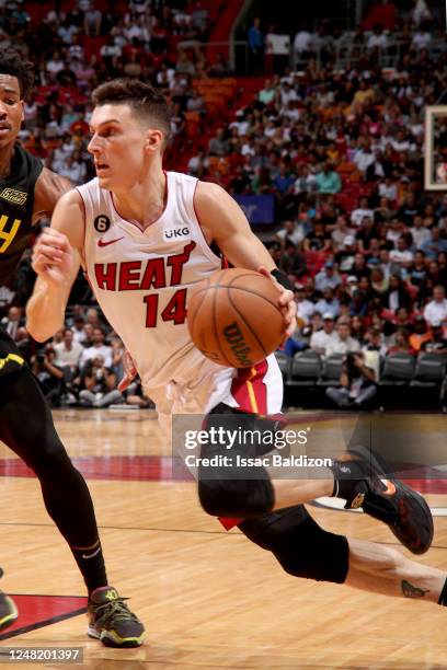 Tyler Herro of the Miami Heat drives to the basket against the Utah Jazz on March 13, 2023 at FTX Arena in Miami, Florida. NOTE TO USER: User...