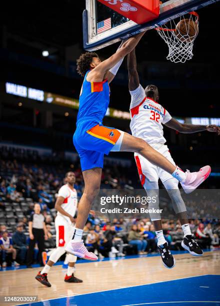 Olivier Sarr of the Oklahoma City Blue dunks the ball during a game against the Ontario Clippers on March 13, 2023 at the Paycom Center in Oklahoma...