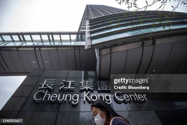 Signage at the Cheung Kong Center building, which houses the headquarters of CK Hutchison Holdings Ltd. And CK Asset Holdings Ltd., in Hong Kong,...
