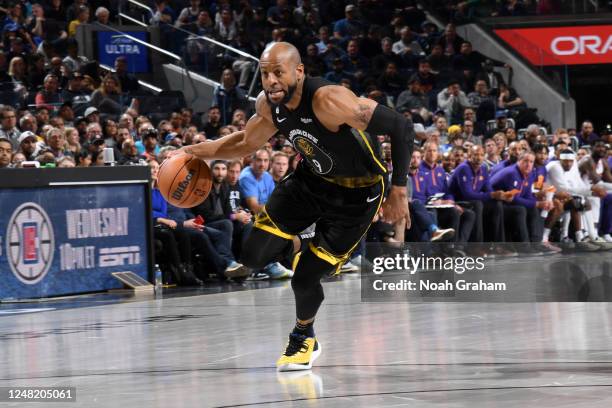 Andre Iguodala of the Golden State Warriors dribbles the ball during the game against the Phoenix Suns on March 13, 2023 at Chase Center in San...