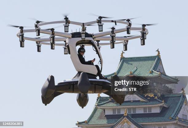 Pilot demonstrates an aircraft manufactured by US-based LIFT Aircraft in front of Osaka Castle in Osaka on March 14, 2023. / Japan OUT