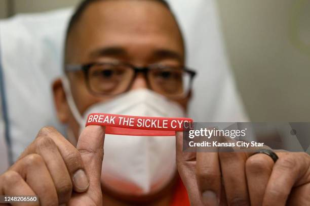 Kevin Wake wears a sickle cell awareness bracelet. He has been treated in hospital emergency rooms as if he were a drug abuser. &quot;I think that...