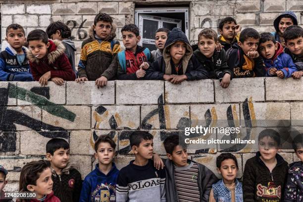 March 2023, Syria, Mashhad Ruhin: Syrian children, mostly orphans, play in the school yard in Mashhad Ruhin camp. Mashhad Ruhin camp, formerly known...