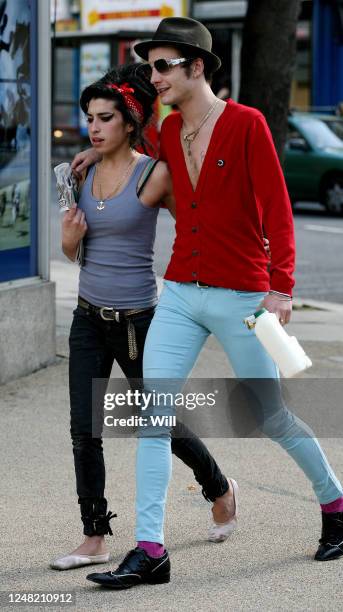 Amy Winehouse and her husband at the time Blake Fielder-Civil look every bit in love, as they stroll through Camden at 8am. They go and buy some...