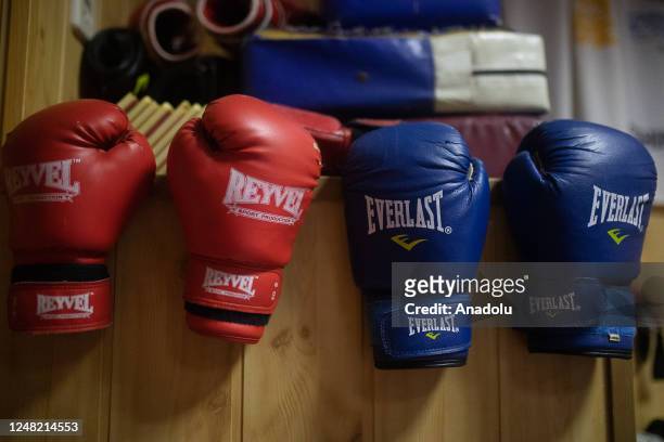 Boxing gloves of 12-year-old Kasprivskiy Maxim, the only karate kid who stays in the city from the first days of war, are seen during his training...