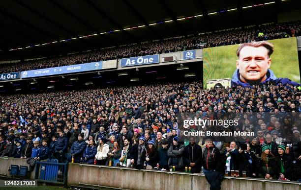 Scotland , United Kingdom - 12 March 2023; Scotland supporters sing their national anthem 'Sweet Flower of Scotland', alongside Stuart Hogg, before...