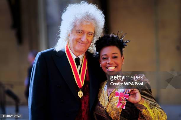 Musicians Sir Brian May, who was made a Knight Bachelor and YolanDa Brown, who was awarded an OBE, by King Charles III during an investiture ceremony...