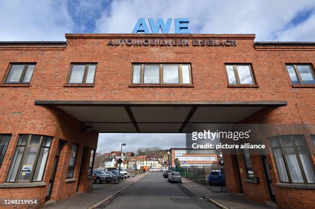 March 2023, Thuringia, Eisenach: The entrance to the former Eisenach automobile plant. Behind it is the industrial monument "O1", formerly the main...