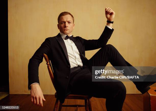 Actor Taron Egerton is photographed backstage at the 2023 EE BAFTA Film Awards, held at The Royal Festival Hall on February 19, 2023 in London,...