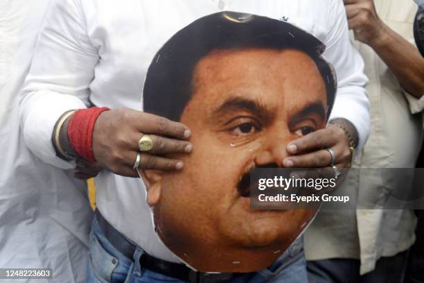 March 13 Kolkata, India: Riot Police confront Congress activists who join a demonstration to protest against Gautam Adani in front of Governors House.