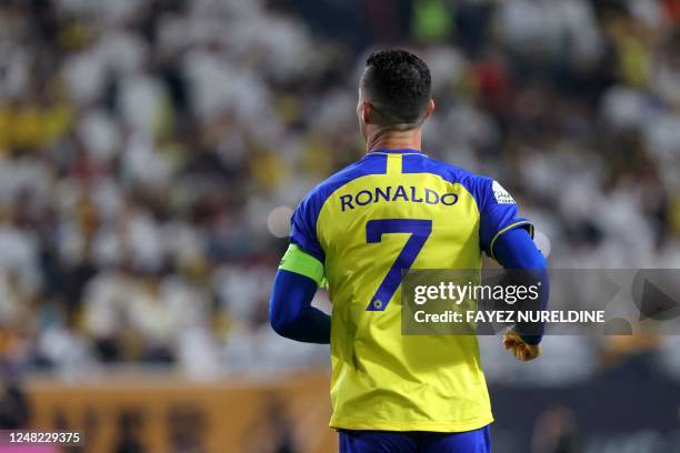 Nassr's Portuguese forward Cristiano Ronaldo runs during the King Cup quarter-final football match between al-Nassr and Abha at Mrsool Park Stadium...