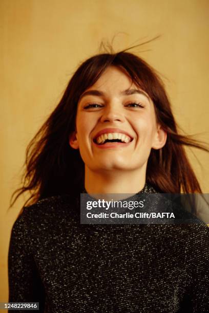 Actor Emma Mackey is photographed backstage at the 2023 EE BAFTA Film Awards, held at The Royal Festival Hall on February 19, 2023 in London, England.