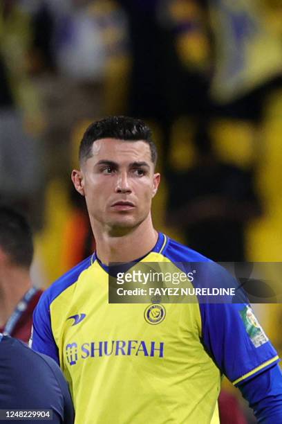 Nassr's Portuguese forward Cristiano Ronaldo looks on after the King Cup quarter-final football match between al-Nassr and Abha at Mrsool Park...