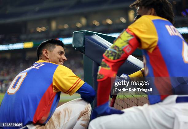 Andrés Giménez and Ronald Acuña Jr. #42 of Team Venezuela talk in the dugout during Game 7 of Pool D between Team Nicaragua and Team Venezuela at...