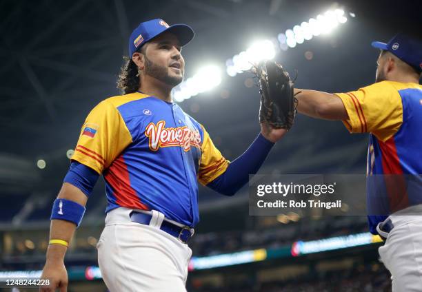 Eugenio Suárez of Team Venezuela walks off the field during Game 7 of Pool D between Team Nicaragua and Team Venezuela at loanDepot Park on Tuesday,...