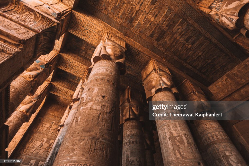 Ancient hieroglyphics carved on the ceiling of the Hypostyle Hall inside Hator Temple in Dendera Egypt