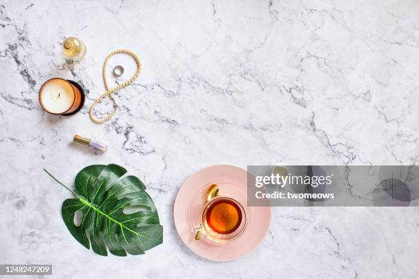 stylised feminine flat lay table top still life. - premium tea bildbanksfoton och bilder