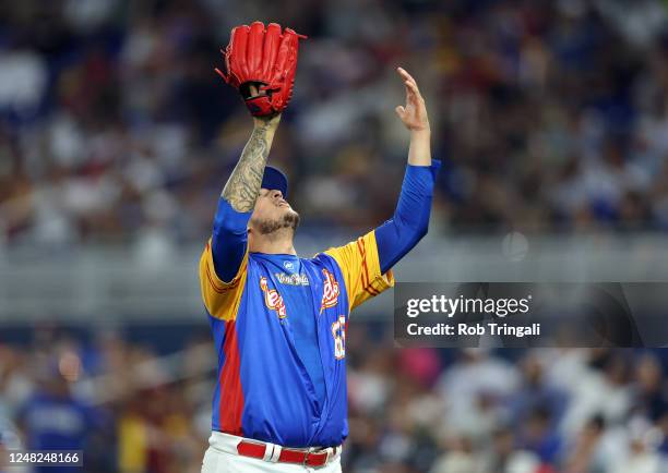José Quijada of Team Venezuela celebrates the final out of the eighth inning of Game 7 of Pool D between Team Nicaragua and Team Venezuela at...