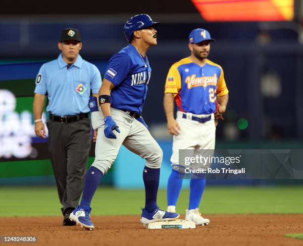 Juan Montes of Team Nicaragua celebrates after hitting a double in the seventh inning of Game 7 of Pool D between Team Nicaragua and Team Venezuela...
