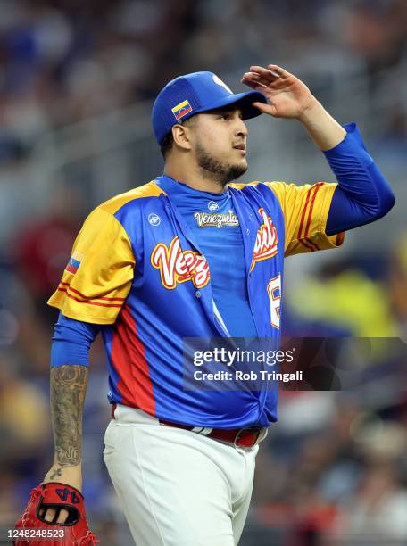 José Quijada of Team Venezuela celebrates the final out of the eighth inning of Game 7 of Pool D between Team Nicaragua and Team Venezuela at...