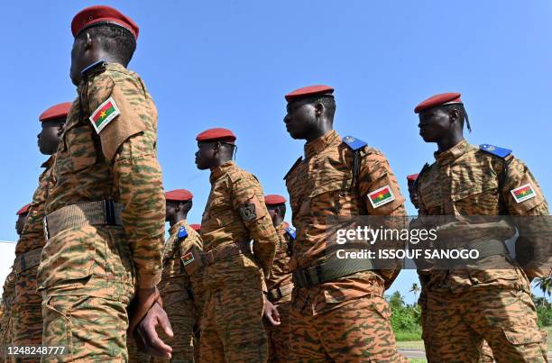 Burkina Faso soldiers take part in the annual US-led Flintlock military training closing ceremony hosted by the Internationl Counter-Terrorism...