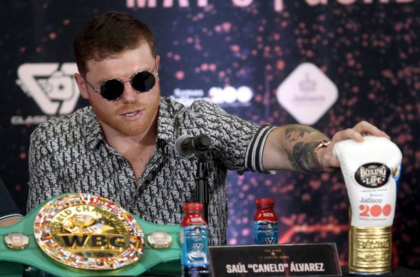 Mexican boxer Canelo Alvarez gestures during a press conference to present his fight against English boxer John Ryder on May 6, in Zapopan, Jalisco...