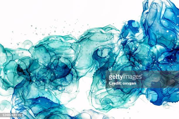 alcohol ink abstract wash background. mixing aqua blue acrylic paints. marble texture - abstract watercolour stock pictures, royalty-free photos & images