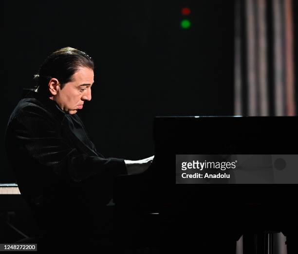 Turkish pianist and composer Fazil Say plays during the âUnis face au seismeâ solidarity concert to help the suvivors of the recent earthquakes in...