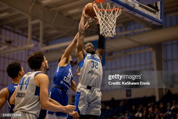 Norense Odiase of the Texas Legends dunks the ball during the game against the Delaware Blue Coats on March 14, 2023 at Chase Field House in...